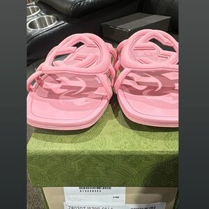Pink rubber Gucci slides purchased September 2024 slightly used
